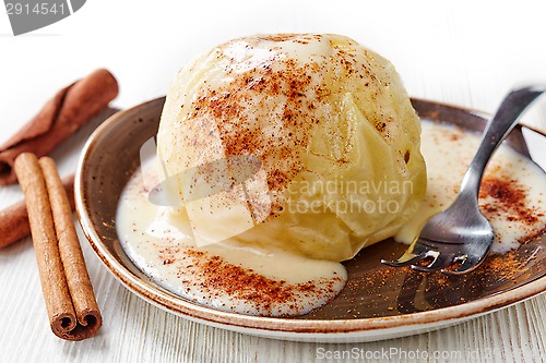 Image of baked apple with vanilla sauce