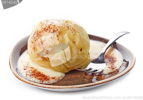 Image of baked apple with vanilla sauce