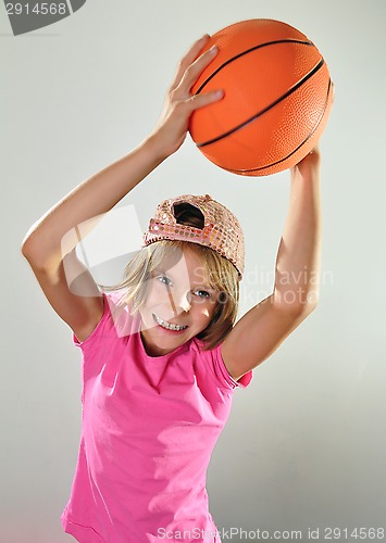 Image of child exercising with a ball