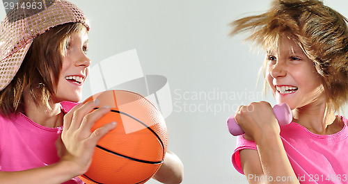 Image of child exercising with dumbbells
