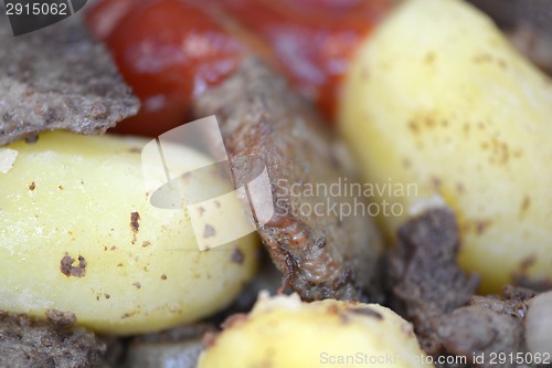 Image of Fried pork liver with tomatoes and potatoes