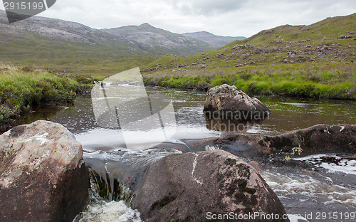 Image of Landscape with waterfall in the mountains