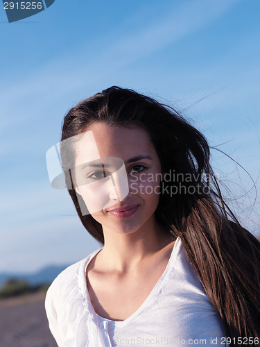 Image of young couple  on beach have fun