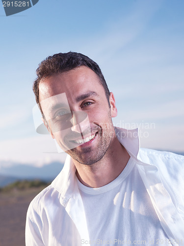 Image of young couple  on beach have fun