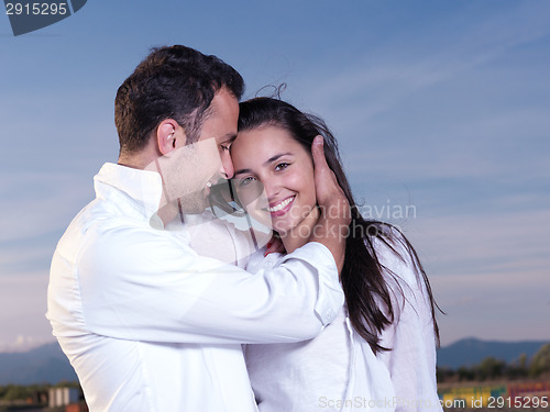 Image of young couple  on beach have fun
