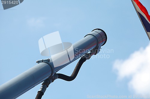 Image of  gun barrel and flag