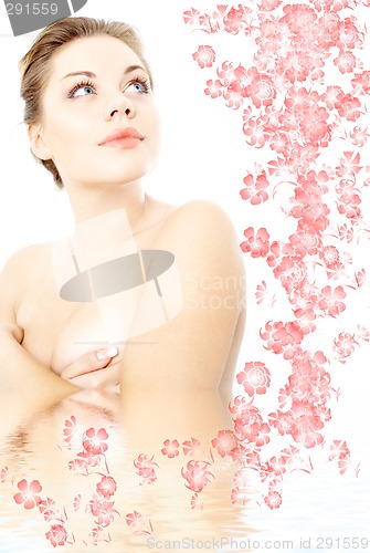 Image of clean lady in water with flowers #2
