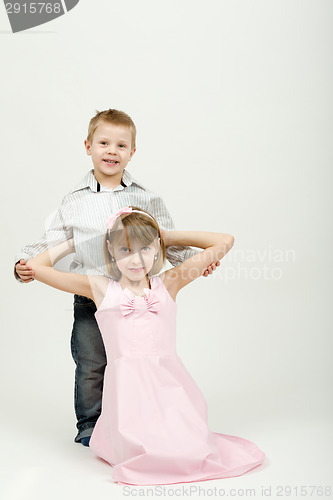 Image of Studio portrait of siblings beautiful boy and girl