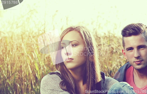 Image of angry young couple partnership problem outdoor