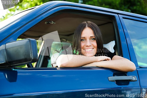 Image of Lady and car