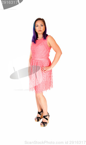Image of Woman in pink dress.