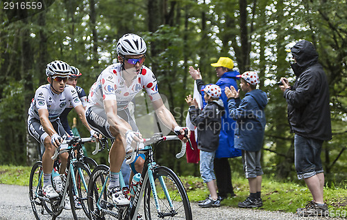 Image of Polka Dot Jersey and White Jersey in Action