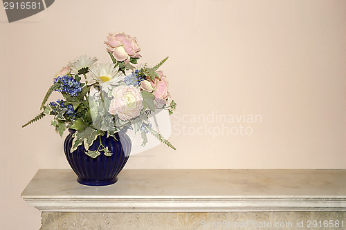 Image of Flowers in a blue vase 