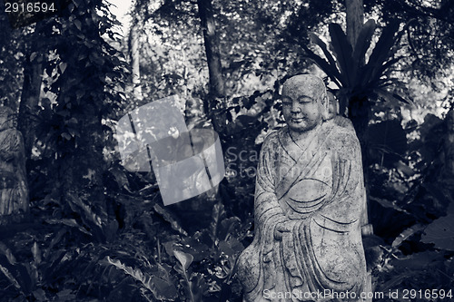 Image of Ruined statue Ksitigarbha Bodhisattva 