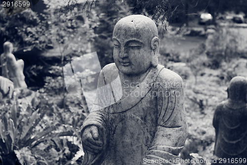 Image of Ruined statue Ksitigarbha Bodhisattva 