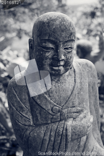 Image of Ruined statue Ksitigarbha Bodhisattva 