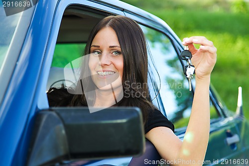 Image of Lady and car