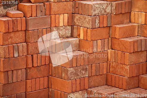 Image of Pile of red bricks prepared for building