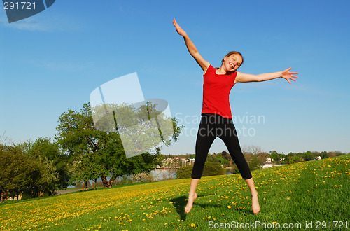 Image of Young girl jumping