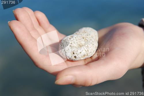 Image of Hand with stone