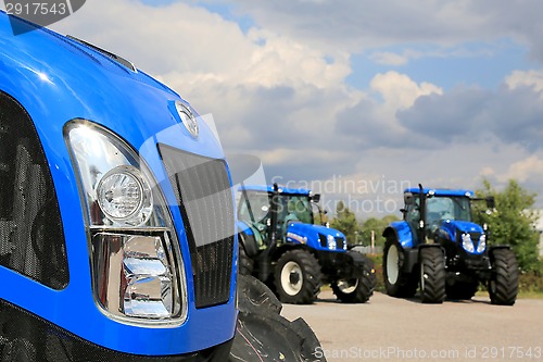 Image of Group of New Holland Agricultural Tractors on Display