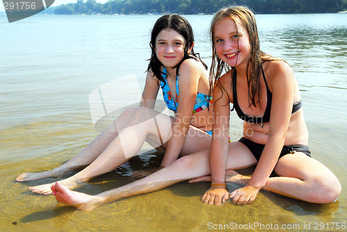 Image of Two girls in water