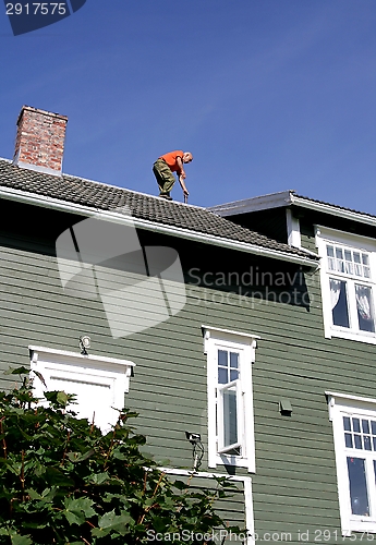 Image of Man on a roof