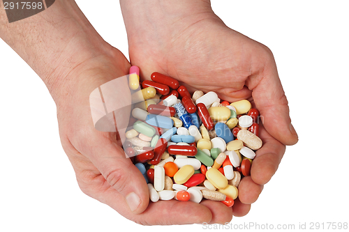 Image of Hands with pills