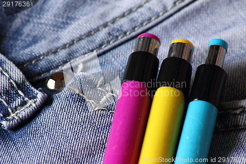 Image of Jeans and pens