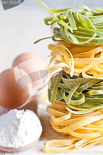 Image of italian pasta tagliatelli, flour and eggs