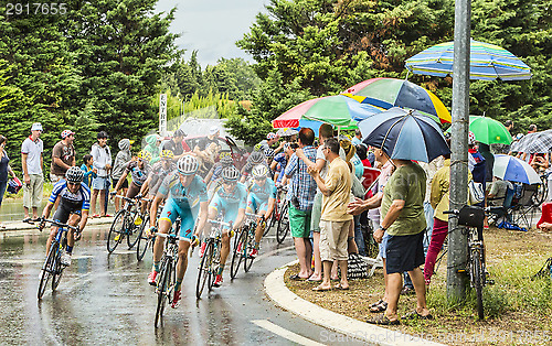 Image of The Peloton in a Rainy Day