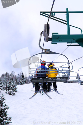 Image of Skiers on chairlift