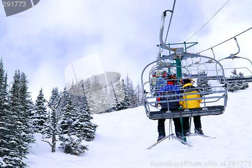 Image of Skiers on chairlift