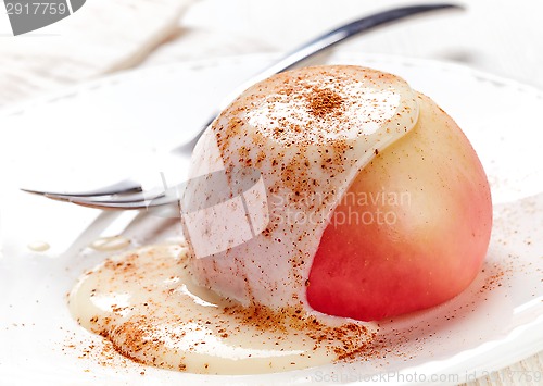Image of baked apple dessert with vanilla sauce