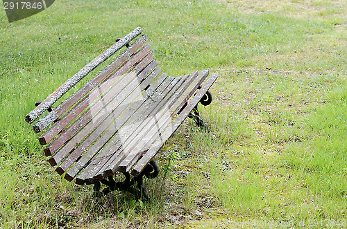 Image of old moss-covered bench