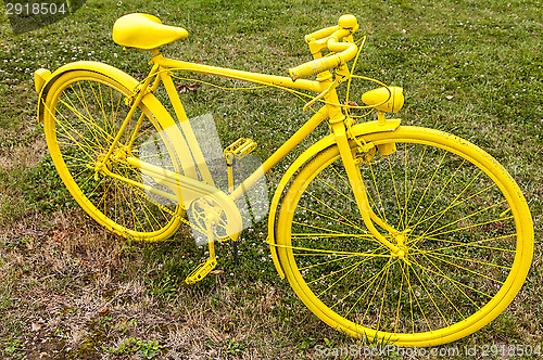 Image of Old Yellow Bicycle in a Field