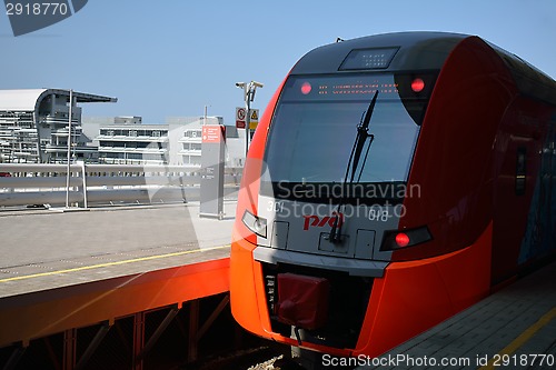 Image of The train standing at the railway station "Olimpiyskiy park"