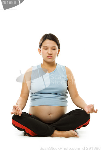 Image of Pregnant woman meditating