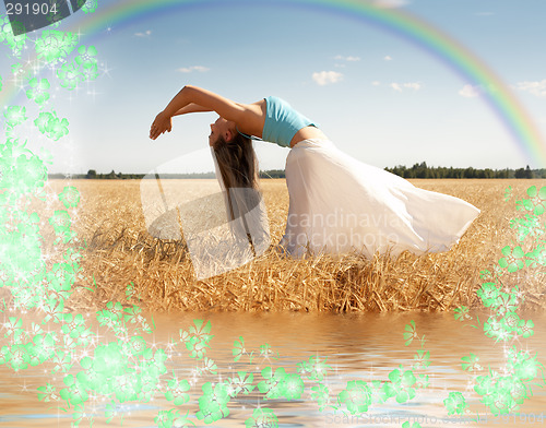 Image of stretching woman with rainbow, water and flowers