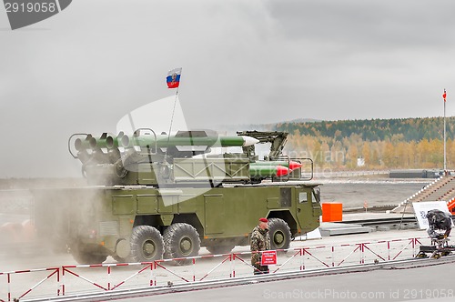 Image of Buk-M1-2 surface-to-air missile systems in smoke