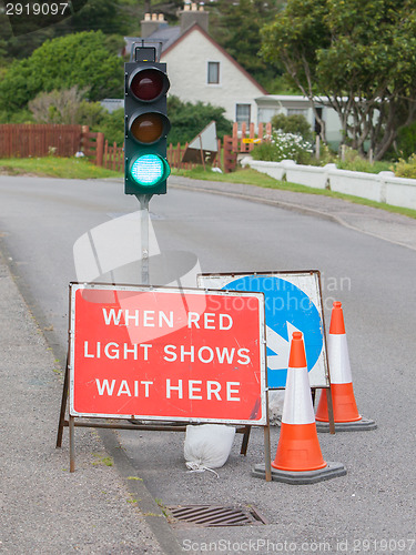 Image of Emergency traffic light with sign