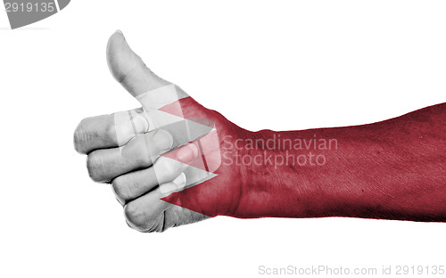 Image of Old woman with arthritis giving the thumbs up sign