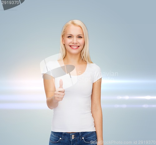 Image of woman showing thumbs up