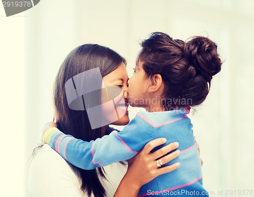 Image of hugging mother and daughter