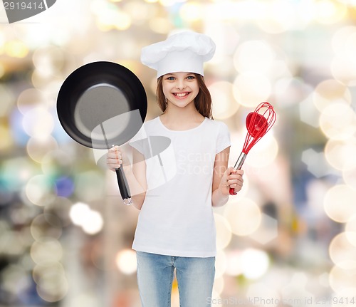 Image of smiling little girl in white blank t-shirt