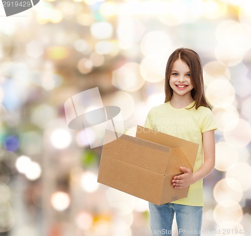 Image of smiling little girl in white blank t-shirt