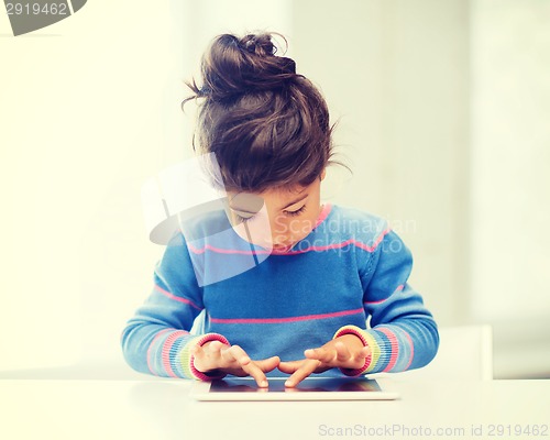 Image of girl with tablet pc at home