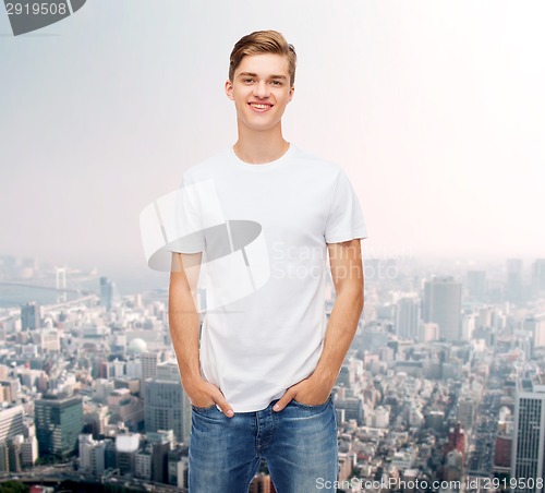 Image of smiling young man in blank white t-shirt