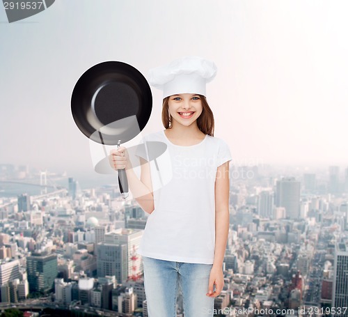 Image of smiling little girl in white blank t-shirt