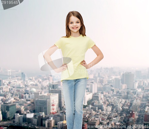 Image of smiling little girl in casual clothes